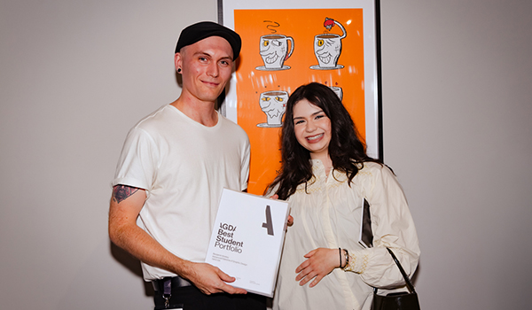 Ben Anstey receives an award for Best Student Portfolio from AGDA.